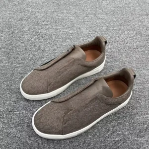 Triple Stitch Men’s Low Top Round Toe Rubber Outsole Slip On Sneakers Elastic Breathable White